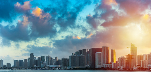 Fototapeta na wymiar Dark clouds over downtown Miami at sunset