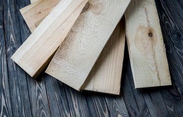 fresh pine boards on wooden background