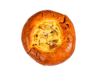 Sweet bun with cottage cheese and raisins isolated on a white background