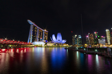 Fototapeta na wymiar Singapore skyline cityscape around marina bay at night .