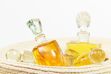 Vintage perfume in the woven straw