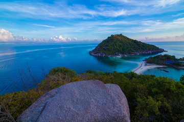 Fototapeta premium Beautiful sunrise sea beach colorful sky cloud with rocky
