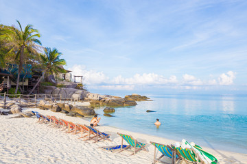 Colorful beach chair summer vacation on white sand beach
