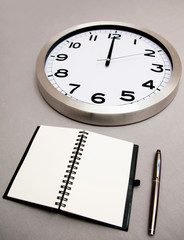 Notebook and clock