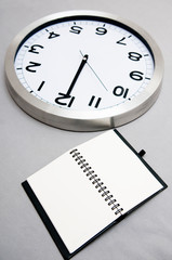 Notebook and clock