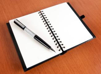 Notebook and pen