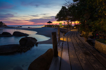 Silhouette sunset at beautiful beach with colorful sky cloud