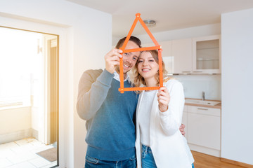 Woman and man having had success in finding a new apartment