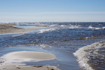 sun reflection in the waves of the sea