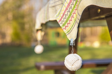 Clip tablecloth weights attached to a table cloth outdoors these are designed to hold your table...