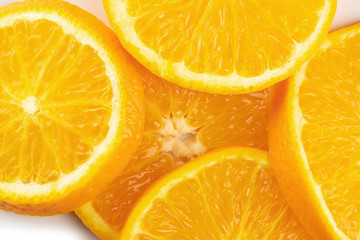Fresh Sliced ​​oranges isolated over white background