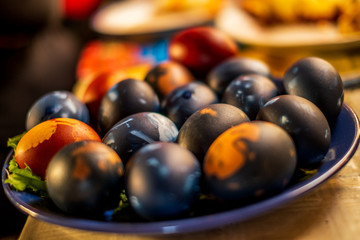 Traditional easter eggs on a plate isolated with a blurred background