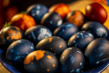 Traditional easter eggs on a plate isolated with a blurred background