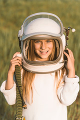 Kid with astronaut helmet