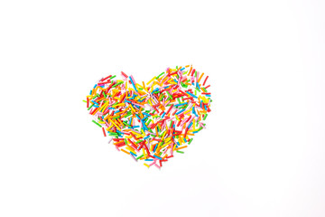 Candy heart shape. Minimalistic sweet concept. Decoration for cake and bakery as a background. Isolated on white. 
