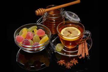 Fruit marmalade, honey and tea.