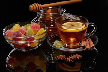 Fruit marmalade, honey and tea.