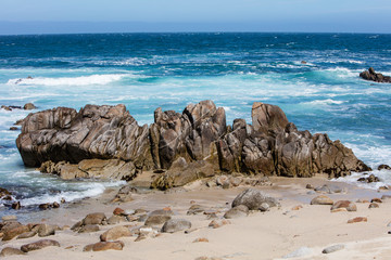 The nutrient-rich waters of the Pacific Ocean washes against the beautiful, rocky California coastline just south of Monterey Bay. This area is known for its spectacular natural scenery.