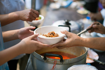 The hands of the rich give food to the hands of the poor : Social Problems of Poverty Helped by Feeding : Concepts problems of life the poor : The concept of sharing