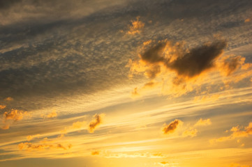 Dramatic sweeping golden peaceful sunset sky.