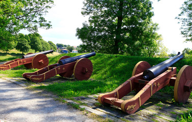 Cannons on the Fortress wall of Gamlebyen - obrazy, fototapety, plakaty