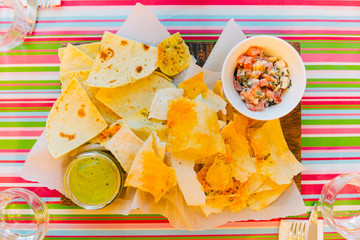 mexican meal party, mexican meal, festive cheese cutting