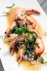 asian prawns sauteed in spicy garlic chilli and turmeric sauce