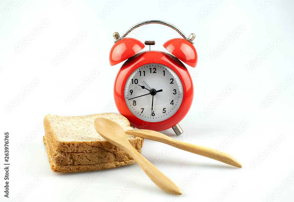 Wall mural red alarm clock with toast bread