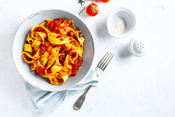 Tasty italian pizza with tomato sauce and parmesan