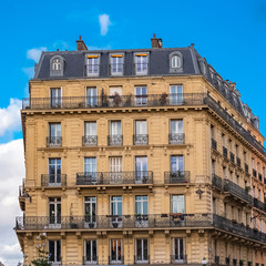 Fototapeta na wymiar Paris, beautiful building in the center, typical parisian facade in the Marais 