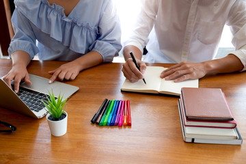 Tutor, learning, education, Group of young people learning studying lesson in library during helping teaching friend education prepare for exam, youth campus friendship teenager teens concept