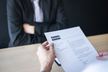 Employer arriving for a job interview, businessman listen to candidate answers explaining about his profile and colloquy dream job, manager sitting in job Interview talking in office