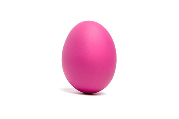 Magenta Easter egg isolated on white background. Traditional symbol of Christian holiday