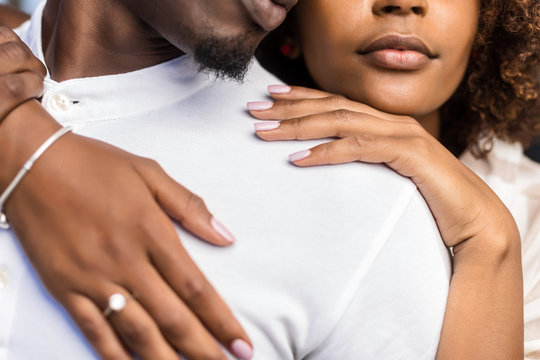 Close up outdoor protrait of black african american couple embracing each other
