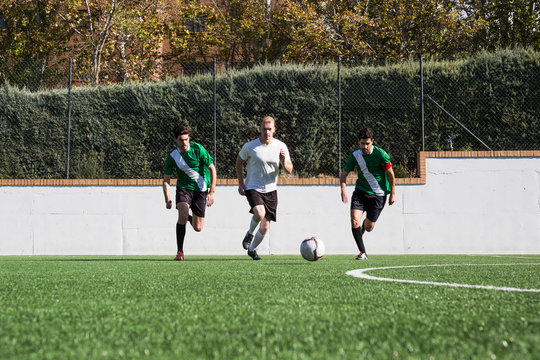 Football players during a match on the field