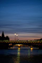 Fototapeta premium Bridge in Paris by Sunset with Seine