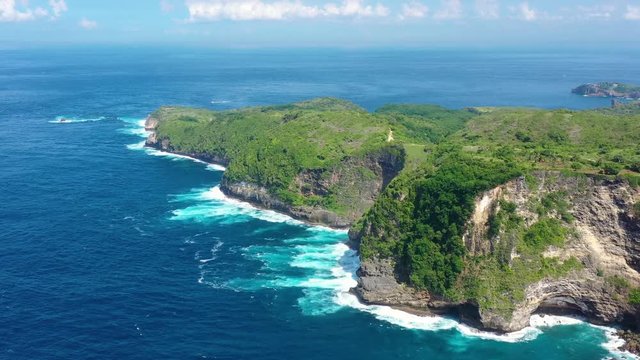 Aerial view at sea and rocks. Turquoise water background from top view. Summer seascape from air. Kelingking beach, Nusa Penida, Bali, Indonesia. Travel - image