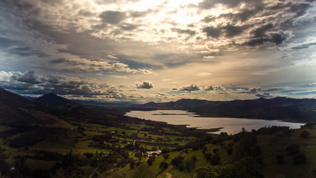 Landscape view of a section of the Tomine reservoir, in the Andean mountains of central Colombia, at the begining of sunset.