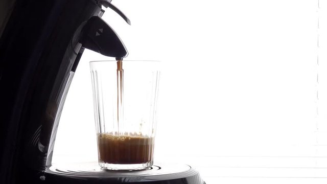 making a fresh glass of coffee