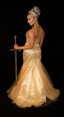 Golden goddess in crown with sword