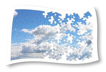 Climate changes concept image with a cloudy sky in puzzle shape