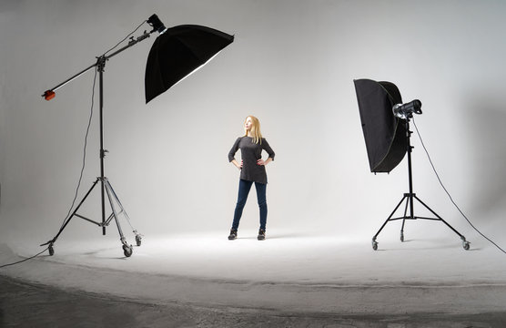 Studio photo with spotlights, girl in full growth.