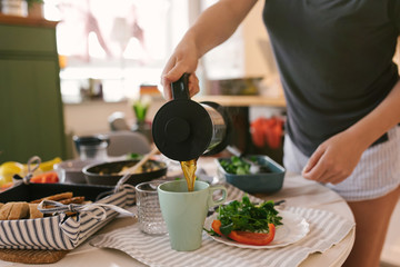 Close-up of kitchen table with breakfast ready to eat.