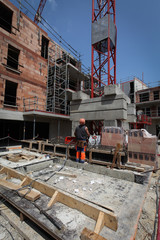 La grue et l'ouvrier