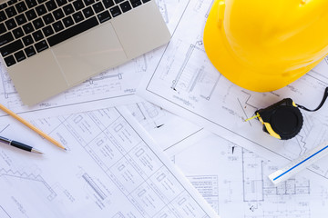 Time for working concept office worker is almost finish working, Alarm clock on laptop and plan consrtuction