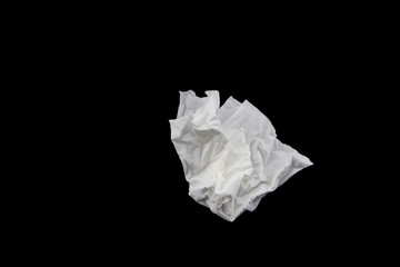 Used screwed paper tissue on dark background. Valueless concept.Clipping path.