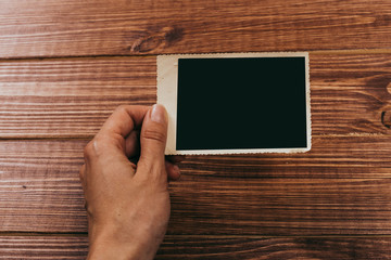 retro some old photos on wooden table