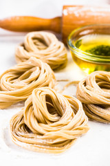 Raw uncooked fresh pasta nest
