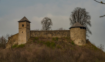Fototapeta premium Brumov town and castle in east Moravia in spring cloudy day
