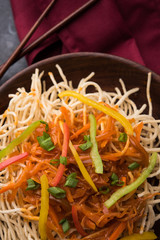 American chop suey/ chopsuey is a popular indochinese food. served in a bowl with chop sticks. selective focus